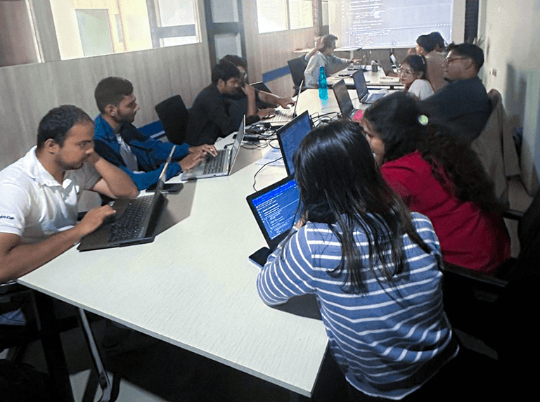 Students collaborating in a Simnyx classroom